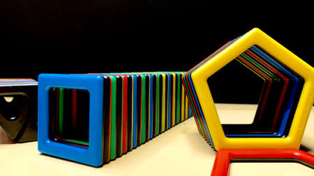Magnetic multi-colored constructor for children in the form of geometric shapes. Development of...