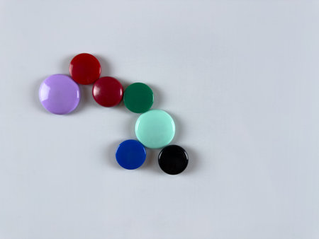 Whiteboard with scattered magnets great for organizing notes and tasks in office and school....