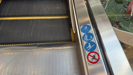Sticker with signs with rules for using escalator. Safe behavior on escalator to prevent injuries...