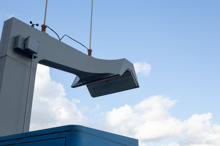 Electric bus charging station with an overhead pantograph system. The bus connects automatically to...
