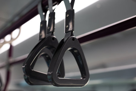 Close up of handrails in subway train. Sturdy handles provide safety and comfort for passengers...