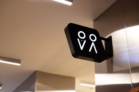 Simple geometric shapes on public restroom sign differentiate genders. Triangle and circle symbolize male silhouette, while upside down triangle and circle represent female symbol for toilet areaの写真素材