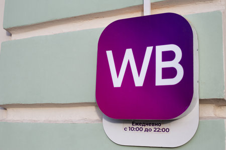 Moscow, Russia, November 16, 2025: Pick up your order at Wildberries pickup point during your scheduled pickup time. Sign with large marketplace logo and opening hours is displayedのeditorial素材