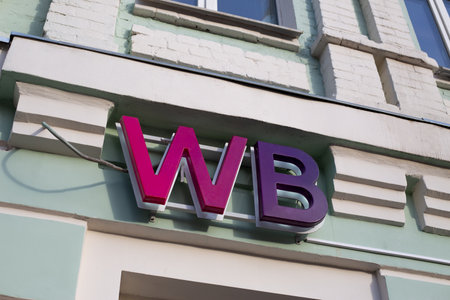 Moscow, Russia, November 16, 2025: Wildberries marketplace sign on the wall above window. Photo for news and article project about Wildberries marketplace and delivery serviceのeditorial素材