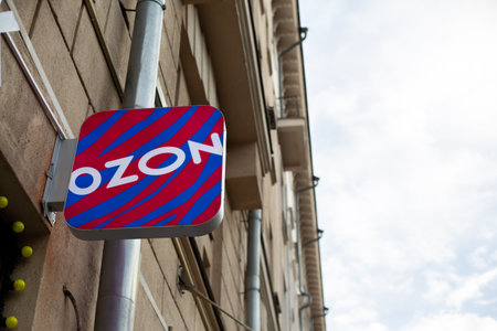 Moscow, Russia, November 16, 2025: Sign on building at entrance to Ozon pickup point. Logo of popular marketplace for fast delivery. News and article about Ozon company eventsのeditorial素材