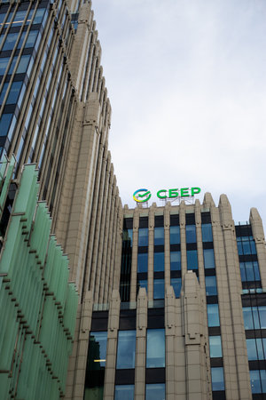 Moscow, Russia, November 16, 2025: The green Sber logo with checkmark. Sign on Sberbank office building in Oruzheny business centerのeditorial素材