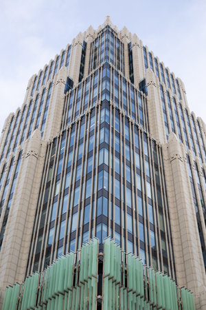 Moscow, Russia, November 16, 2025: Vertical photo of corner of building with symmetrical design. The oruzheyny business center on Moscow Garden Ring. Tall building with symmetrical designのeditorial素材