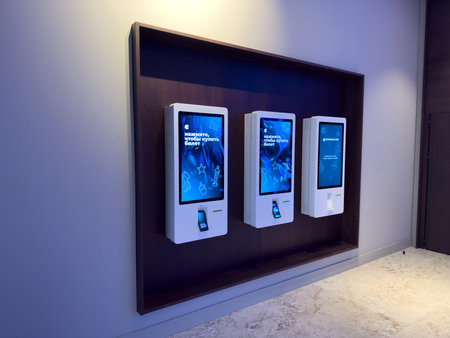 Moscow, Russia, December 2, 2025: Modern ticket vending machines for self service cinema ticket purchases. Self service ticket counter at Cinema Star. Cinema ticket selection and purchaseのeditorial素材