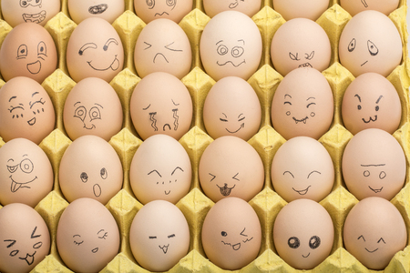 a group of eggs with expressionsの写真素材