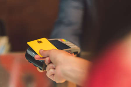 Person paying with a credit cardの写真素材