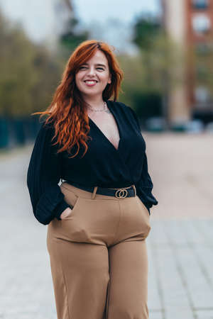 portrait of a smiling Caucasian woman with red hairの写真素材