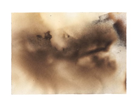 burnt paper isolated on a white backgroundの写真素材