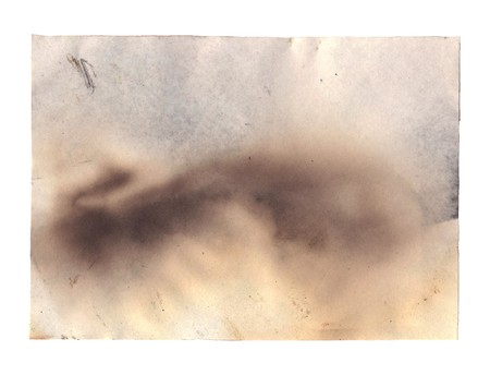 burnt paper isolated on a white backgroundの写真素材
