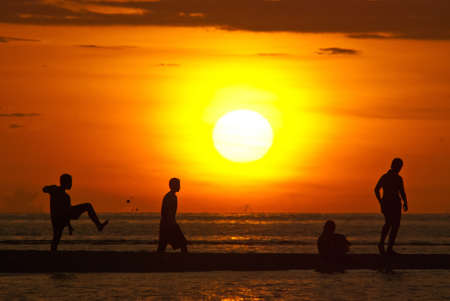 beach football during sunsetの写真素材