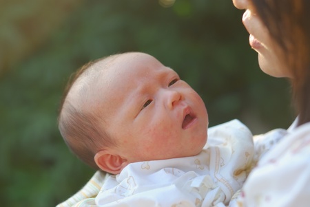 new born infant firt few days different positionsの写真素材