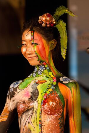 KO SAMUI, THAILAND - MARCH 26,2011 - Model picture body painting in Ko Samui island, Thailand. The first body painting in asia.のeditorial素材