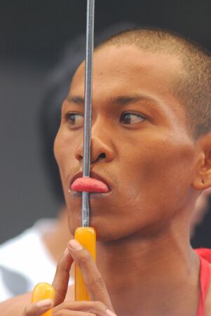 PHUKET, THAILAND - OCTOBER,2010 - participant picture in caravan of phuket vegetarian festival in Phuket province, Thailand. The   very famous vegetarian festival of THAILAND. のeditorial素材