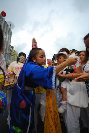 PHUKET, THAILAND - OCTOBER,2010 - participant picture in caravan of phuket vegetarian festival in Phuket province, Thailand. The   very famous vegetarian festival of THAILAND. のeditorial素材