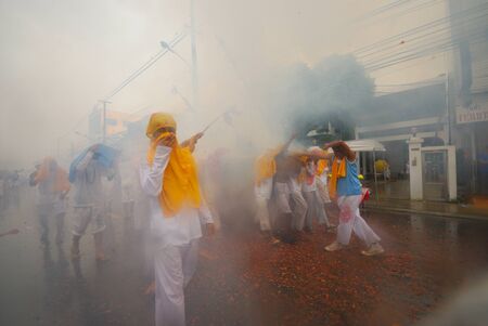 PHUKET, THAILAND - OCTOBER,2010 - participant picture in caravan of phuket vegetarian festival in...