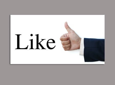 art work for like button from real hand  nice backgroundの写真素材