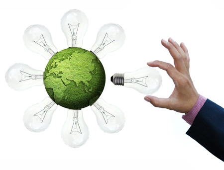 art work for concepts from light bulbs with green grass globe
