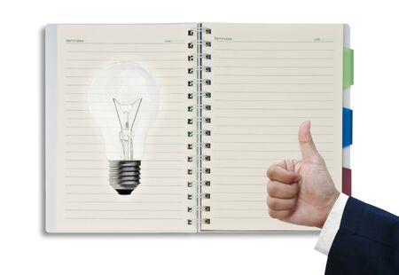 blank open notepad isolated on white backgroundの写真素材