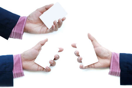 white business card in business man hand isolated on white background
