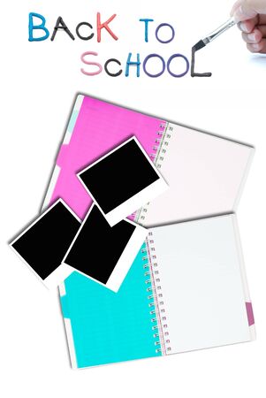 artwork of notepad and blank photo frame on white nackground.の写真素材