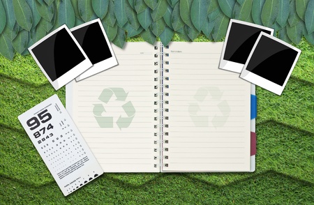 single blank notepad on attractive grass background.の写真素材