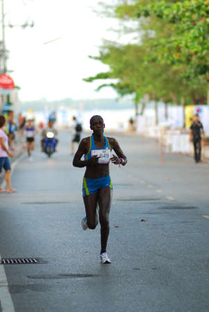 KO SAMUI, THAILAND - SEPTEMBER 18: Particpants of the "2011 Samui Island Marathon at Ko Samui" on September 18,2011 in Ko Samui Island, Thailand. Approximately 5,000 people particpate in the 

international marathon.のeditorial素材