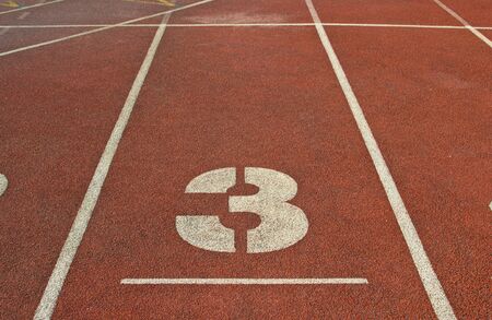Running track number at sport stadium.