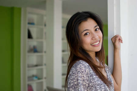Cute young asian woman portrait outdoor scene.
