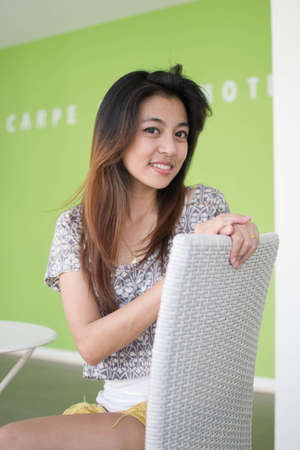 Cute young asian woman portrait outdoor scene.の写真素材