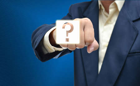 business selection concept by businessman fist picture on gradient blue background.の写真素材