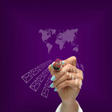 Business selection concept by black pen in hand on purple gradient background.