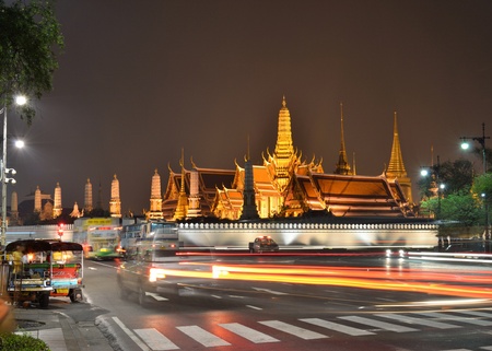BANGKOK-MARCH 28:Traffic in front of Grand Palace at night on March, 28, 2011 in Bangkok.It was built in 1782.The home of the King, the Royal court and the administrative seat of government.のeditorial素材