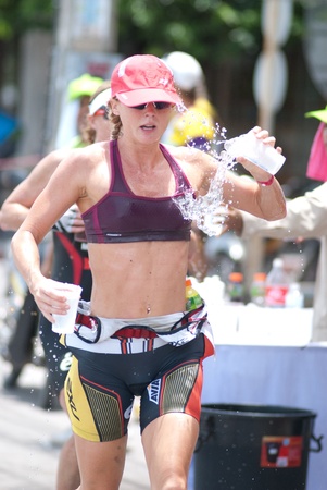 SAMUI, THAILAND - APRIL 22 2012: Samui triathlon 2012 event. Competitors in action during the triathlon on Sunday 22 April 2012 in Ko Samui island, Suratthani, Thailand.のeditorial素材