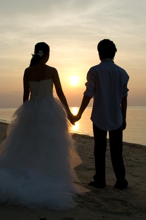 Asian couple with pre wedding sceen out door bckground.の写真素材