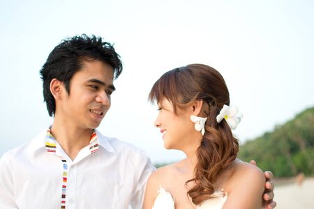 Asian couple with pre wedding sceen out door bckground.の写真素材