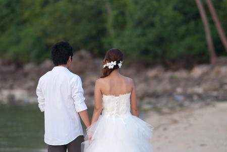 Asian couple with pre wedding sceen out door bckground.の写真素材