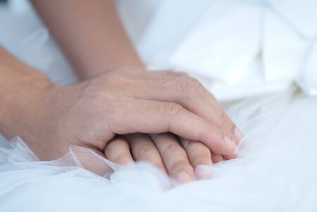 hands with love sign pre wedding sceen out door bckground.の写真素材