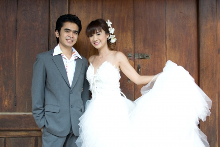 Asian couple with pre wedding scene out door background.の写真素材
