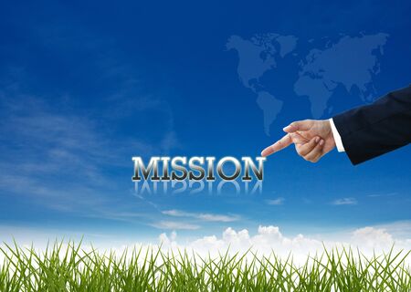 Attractive artwork of business wording on clear sky background with businessman's hand.の写真素材