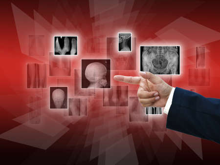 Business hand selecting business icon on medern red abstract background.