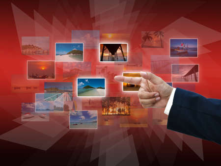 Business hand selecting business icon on medern red abstract background.の写真素材
