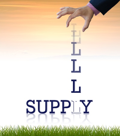 Artwork of business wording with dropping letter from business hand.の写真素材