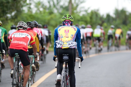 SURATTHANI, THAILAND - JULY 8: Unknown riders in action during "Suratthani bike race 2012" at Suratthani on July 8, 2012 in Suratthani, Thailand.のeditorial素材