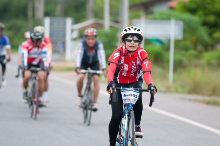 SURATTHANI, THAILAND - JULY 8: Unknown riders in action during "Suratthani bike race 2012" at Suratthani on July 8, 2012 in Suratthani, Thailand.のeditorial素材