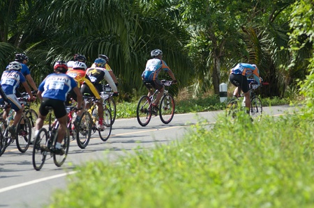 SURATTHANI, THAILAND - JULY 8: Unknown riders in action during "Suratthani bike race 2012" at Suratthani on July 8, 2012 in Suratthani, Thailand.のeditorial素材