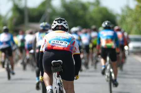 SURATTHANI, THAILAND - JULY 8: Unknown riders in action during "Suratthani bike race 2012" at Suratthani on July 8, 2012 in Suratthani, Thailand.のeditorial素材